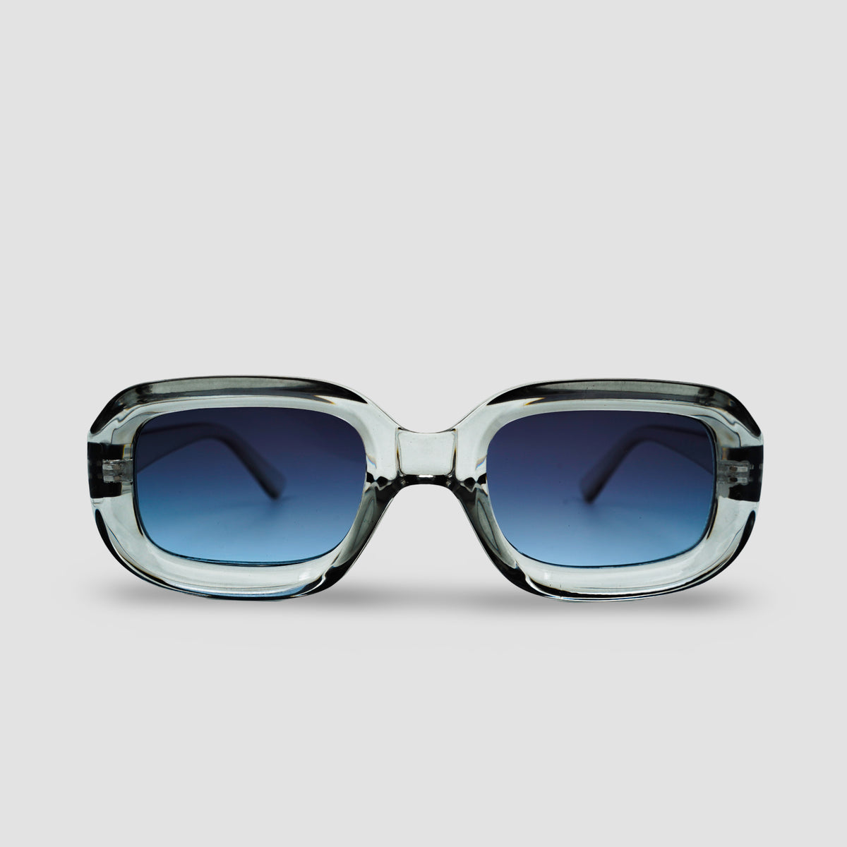 Stijlvolle zonnebril met transparant montuur en blauwe glazen, perfect voor een trendy look.