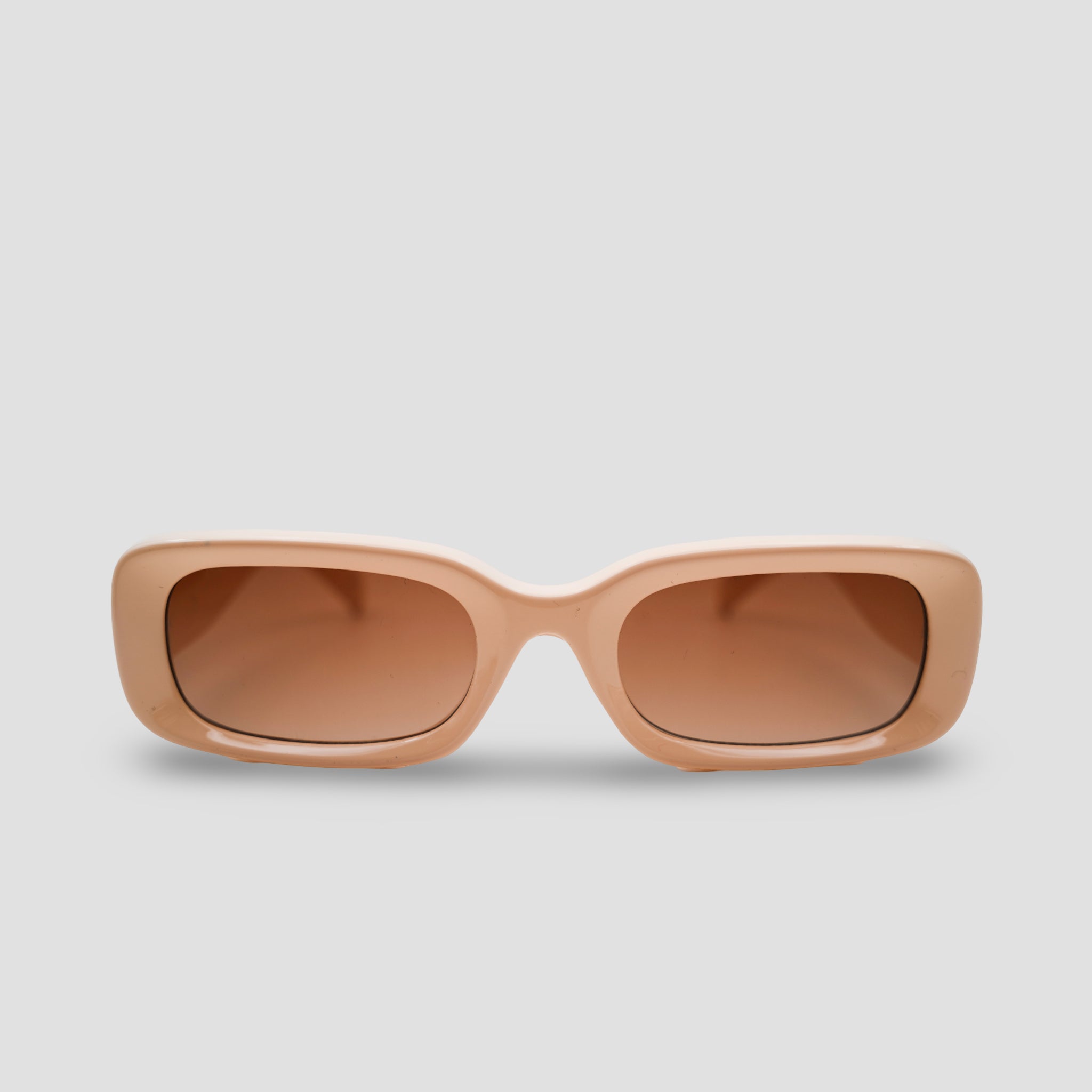 Stijlvolle beige zonnebril met rechthoekige glazen, perfect voor een trendy look.